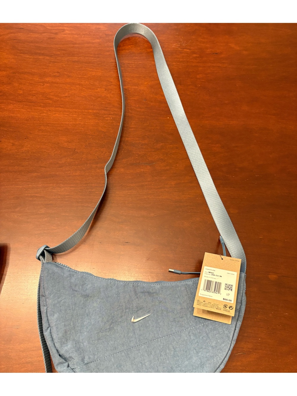 Nike Women’s Light Teal/Blue Sling Bag